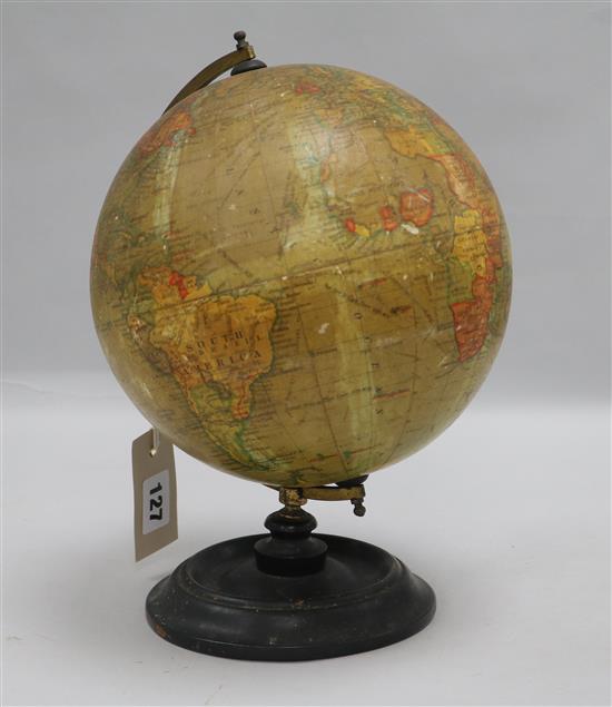 An 8 Inch Terrestrial Globe by Geographia Ltd, 55 Fleet Str., London E.C.4, on turned ebonised stand